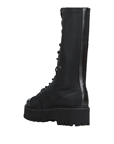 https://images.styletyx.com/images/black-leather-boots-dorothee-schumacher-1267038_3.webp