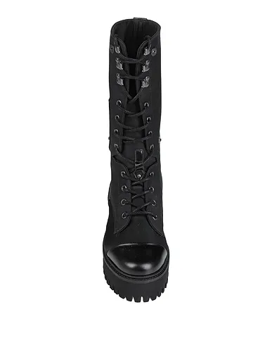 https://images.styletyx.com/images/black-leather-boots-dorothee-schumacher-1267038_4.webp