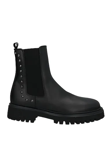 https://images.styletyx.com/images/black-leather-boots-john-galliano-3221757_1.webp