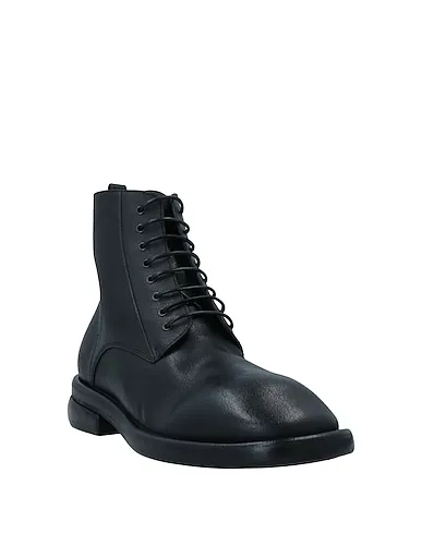 https://images.styletyx.com/images/black-leather-boots-marsell-13048224_2.webp
