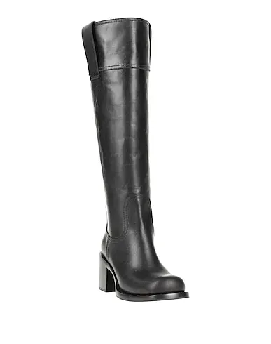https://images.styletyx.com/images/black-leather-boots-miu-miu-243274646_2.webp