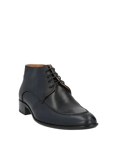https://images.styletyx.com/images/black-leather-boots-nero-giardini-873933205_2.webp