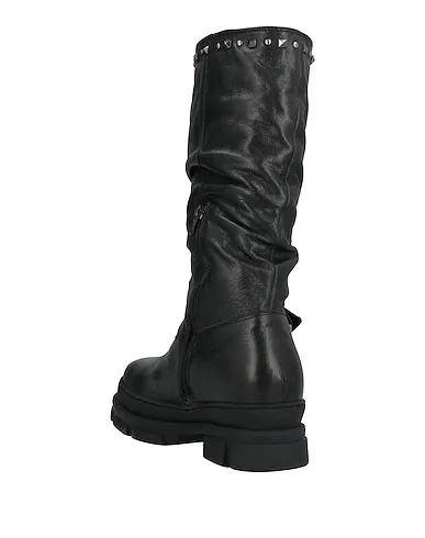 https://images.styletyx.com/images/black-leather-boots-pregunta-13376098_3.webp