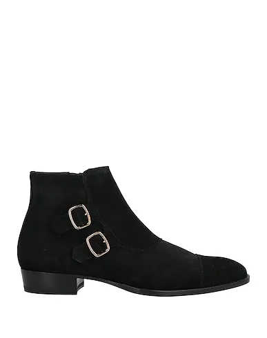 https://images.styletyx.com/images/black-leather-boots-saint-laurent-3169815_1.webp