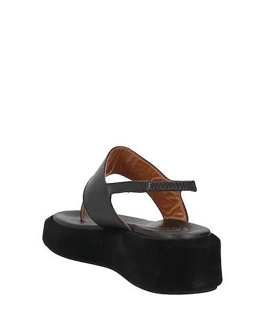 https://images.styletyx.com/images/black-leather-flip-flops-atp-atelier-1004558804_3.webp