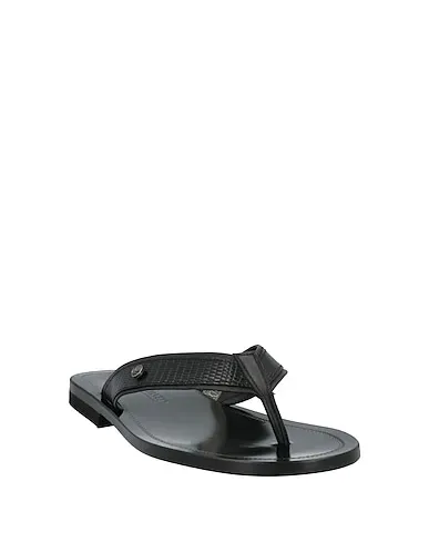 https://images.styletyx.com/images/black-leather-flip-flops-mich-e-simon-13148558_2.webp