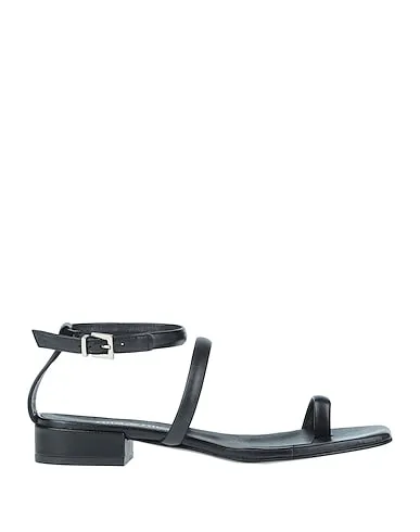 https://images.styletyx.com/images/black-leather-flip-flops-nila-nila-968893_1.webp