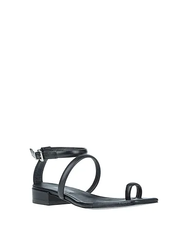 https://images.styletyx.com/images/black-leather-flip-flops-nila-nila-968893_2.webp