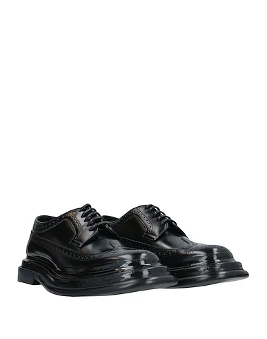 https://images.styletyx.com/images/black-leather-laced-shoes-dolce-gabbana-3144132_2.webp