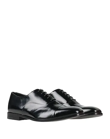 https://images.styletyx.com/images/black-leather-laced-shoes-prada-13253221_2.webp