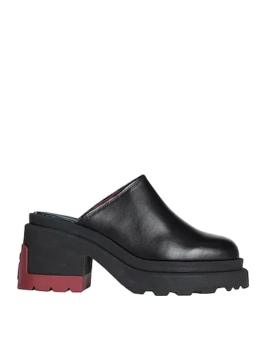 https://images.styletyx.com/images/black-leather-mules-and-clogs-hilfiger-collection-13029684_1.webp