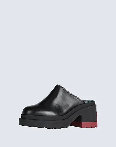 https://images.styletyx.com/images/black-leather-mules-and-clogs-hilfiger-collection-13029684_2.webp