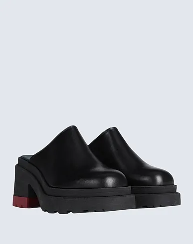 https://images.styletyx.com/images/black-leather-mules-and-clogs-hilfiger-collection-13029684_4.webp
