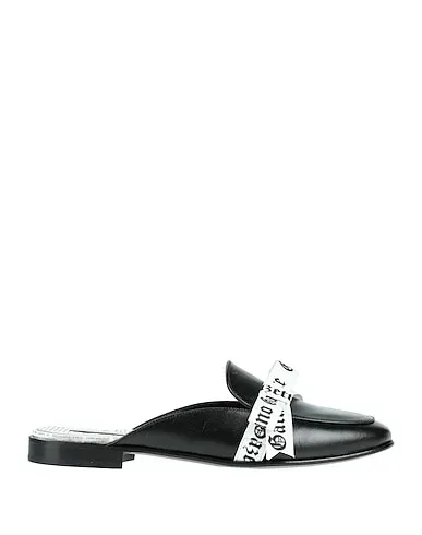 https://images.styletyx.com/images/black-leather-mules-and-clogs-john-galliano-866976_1.webp
