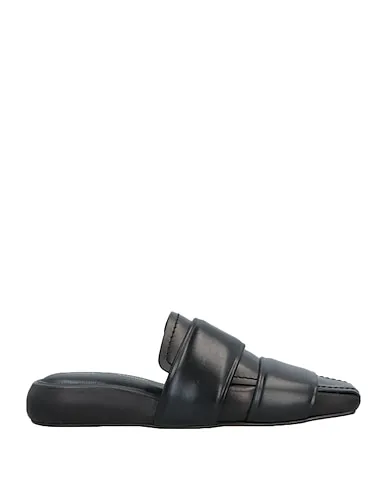 https://images.styletyx.com/images/black-leather-mules-and-clogs-proenza-schouler-3360464_1.webp