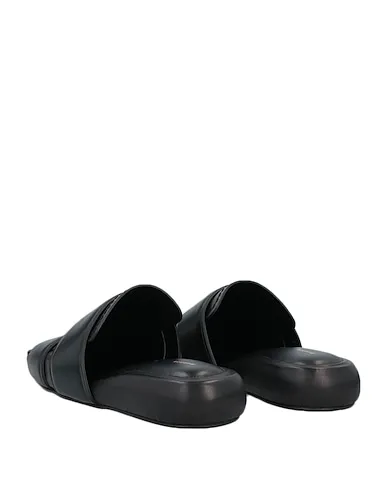 https://images.styletyx.com/images/black-leather-mules-and-clogs-proenza-schouler-3360464_3.webp