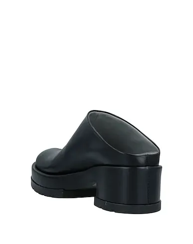 https://images.styletyx.com/images/black-leather-mules-and-clogs-sapio-2684391_3.webp