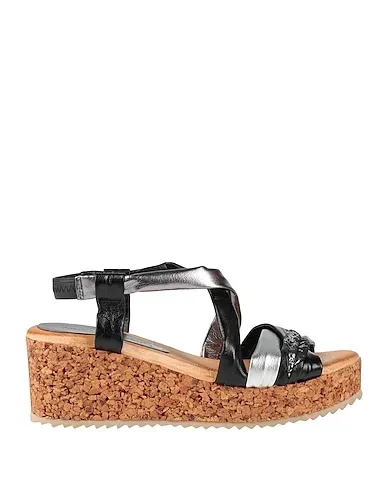 https://images.styletyx.com/images/black-leather-sandals-andrea-sabatini-13156801_1.webp