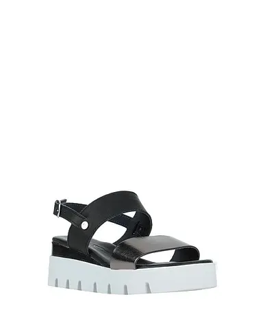 https://images.styletyx.com/images/black-leather-sandals-carlo-pazolini-1335521_2.webp