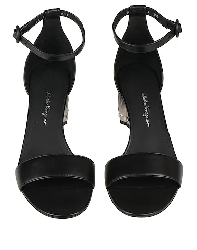 https://images.styletyx.com/images/black-leather-sandals-ferragamo-1224812819_4.webp
