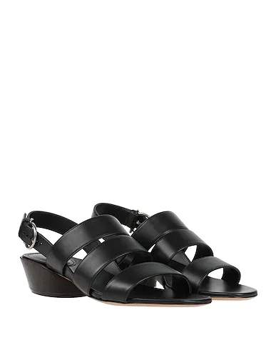 https://images.styletyx.com/images/black-leather-sandals-ferragamo-37490879_2.webp
