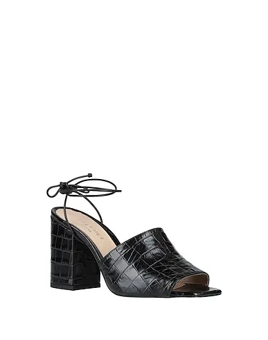 https://images.styletyx.com/images/black-leather-sandals-grey-mer-1176979_2.webp