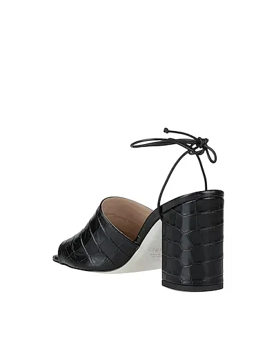 https://images.styletyx.com/images/black-leather-sandals-grey-mer-1176979_3.webp