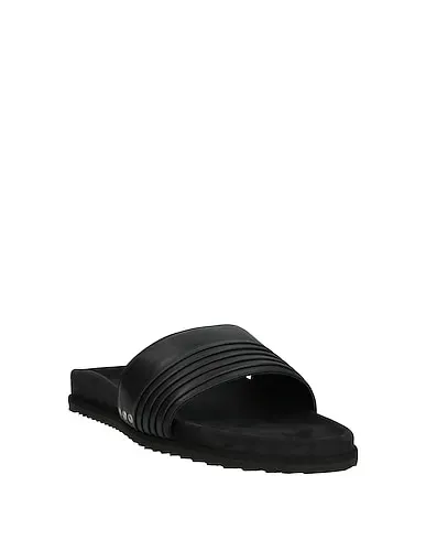 https://images.styletyx.com/images/black-leather-sandals-john-elliott-3064623_2.webp