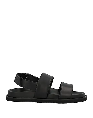 https://images.styletyx.com/images/black-leather-sandals-john-galliano-13300786_1.webp