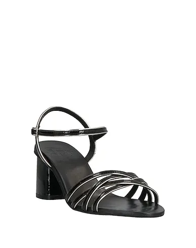 https://images.styletyx.com/images/black-leather-sandals-la-femme-plus-13211795_2.webp
