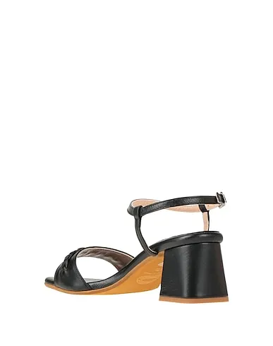 https://images.styletyx.com/images/black-leather-sandals-loretta-pettinari-12920969_3.webp