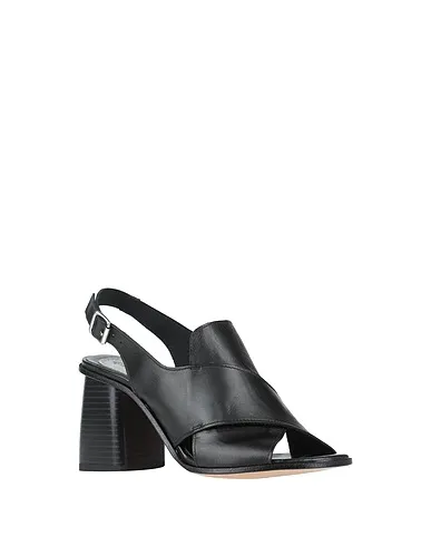 https://images.styletyx.com/images/black-leather-sandals-loretta-pettinari-2354387_2.webp