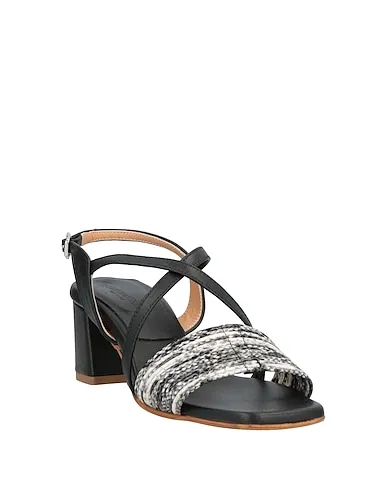 https://images.styletyx.com/images/black-leather-sandals-loretta-pettinari-3053705_2.webp