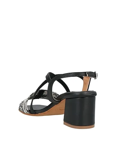 https://images.styletyx.com/images/black-leather-sandals-loretta-pettinari-3053705_3.webp