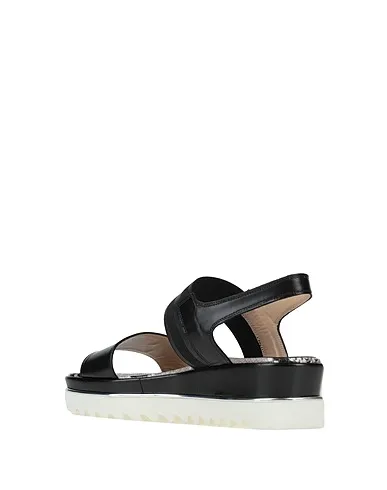 https://images.styletyx.com/images/black-leather-sandals-luca-grossi-1459623_3.webp