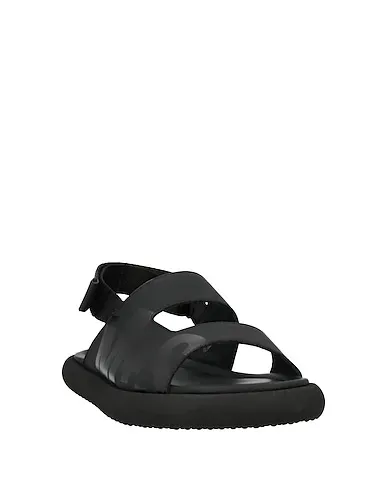 https://images.styletyx.com/images/black-leather-sandals-mich-e-simon-13161125_2.webp
