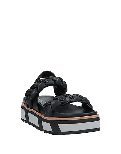https://images.styletyx.com/images/black-leather-sandals-pas-de-rouge-2612091_2.webp