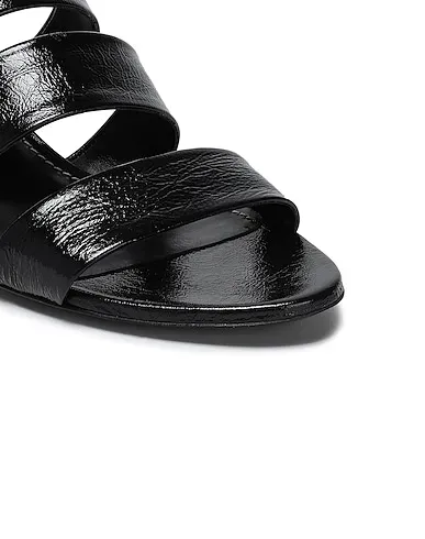 https://images.styletyx.com/images/black-leather-sandals-proenza-schouler-1471642_2.webp
