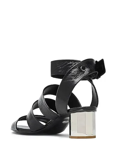 https://images.styletyx.com/images/black-leather-sandals-proenza-schouler-1471642_3.webp