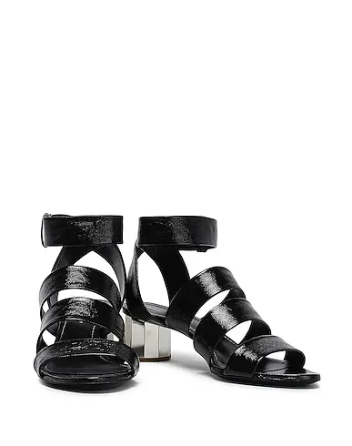 https://images.styletyx.com/images/black-leather-sandals-proenza-schouler-1471642_4.webp