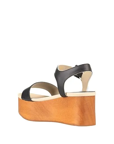 https://images.styletyx.com/images/black-leather-sandals-serafini-etoile-13219193_3.webp