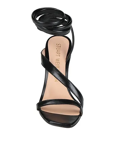 https://images.styletyx.com/images/black-leather-sandals-stuart-weitzman-2278175_4.webp