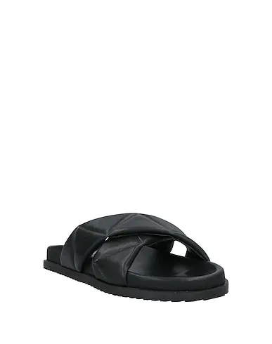 https://images.styletyx.com/images/black-leather-sandals-studio-mode-13302579_2.webp