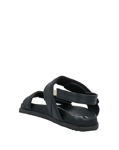 https://images.styletyx.com/images/black-leather-sandals-studio-mode-13302849_3.webp