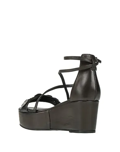 https://images.styletyx.com/images/black-leather-sandals-tsakiris-mallas-710509181_3.webp