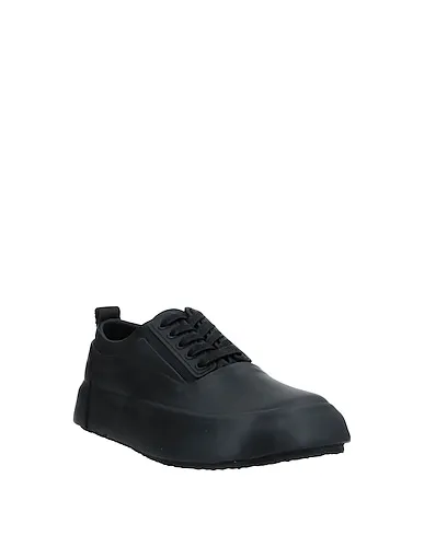 https://images.styletyx.com/images/black-leather-sneakers-ambush-1576185_2.webp