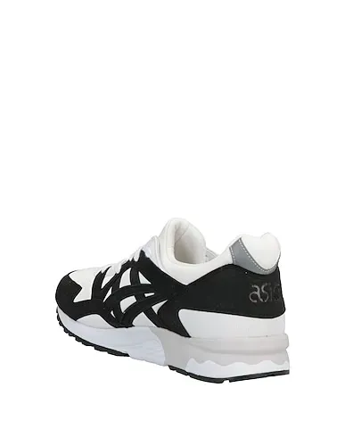 https://images.styletyx.com/images/black-leather-sneakers-comme-des-garcons-x-asics-2838361_3.webp