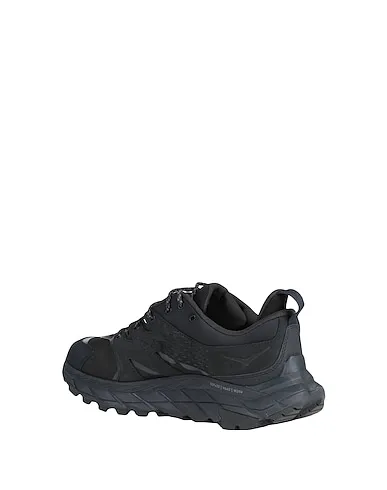 https://images.styletyx.com/images/black-leather-sneakers-m-anacapa-low-gtx-hoka-one-one-13225724_3.webp