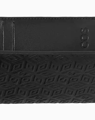https://images.styletyx.com/images/black-leather-wallet-cos-13141001_2.webp