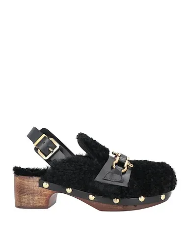 https://images.styletyx.com/images/black-mules-and-clogs-paola-d-arcano-1906397443_1.webp